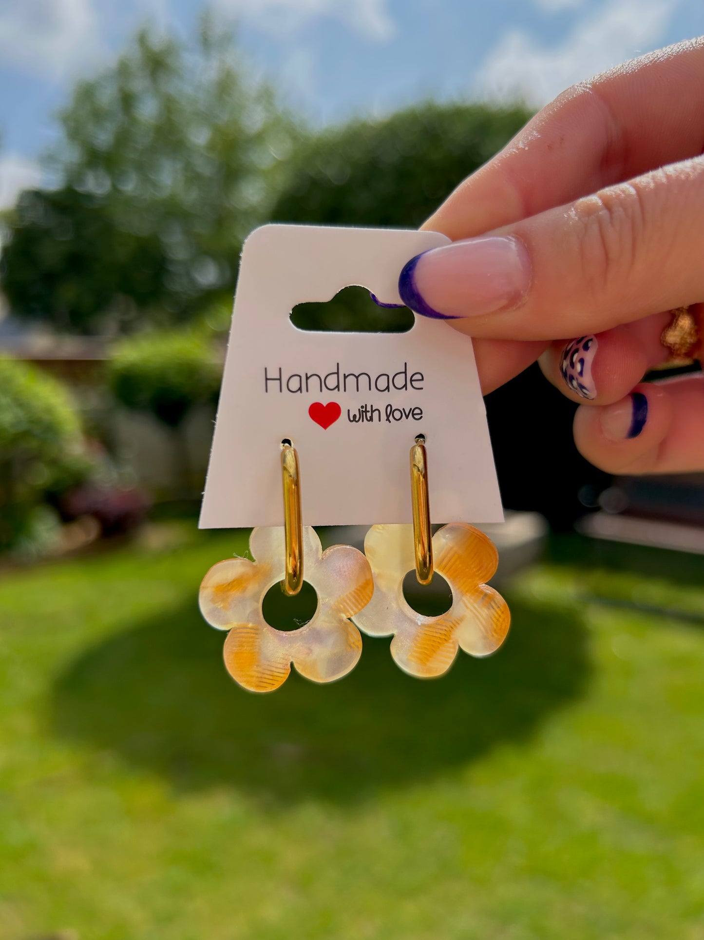 Boucles d’oreilles, dorées, fleurs