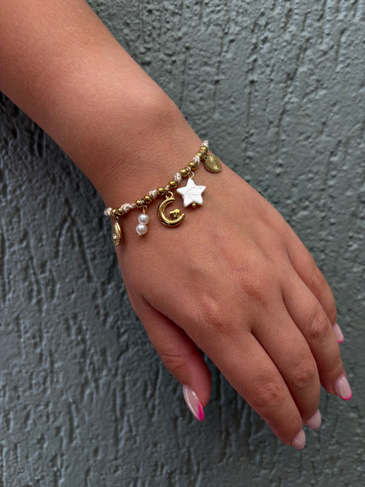 Bracelet corde et chamrs