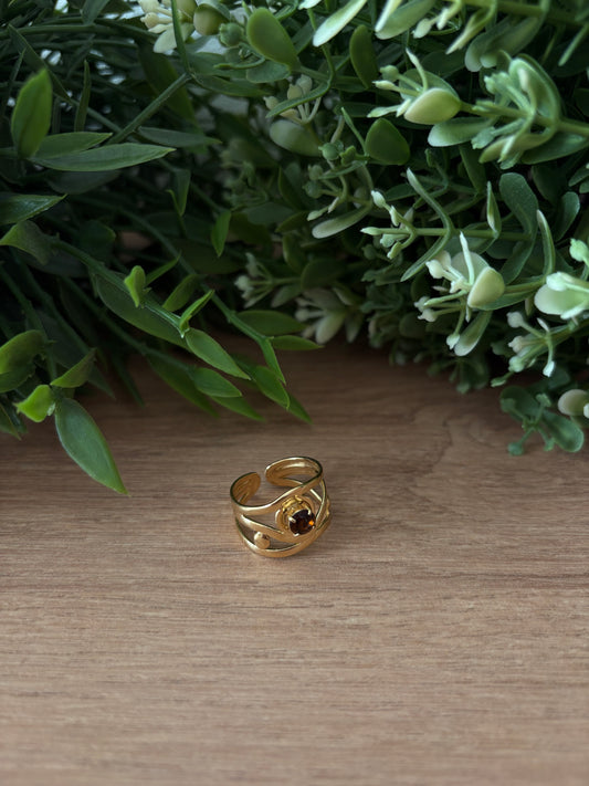 Bague doré, pierre marron