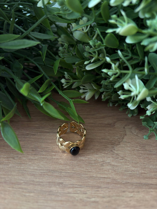 Bague doré, pierre noire